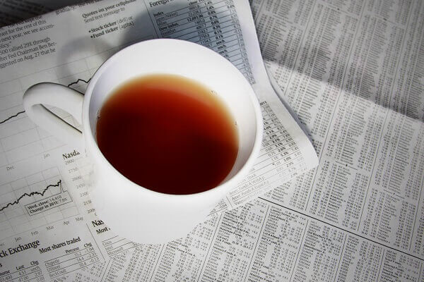 tea cup and newspaper